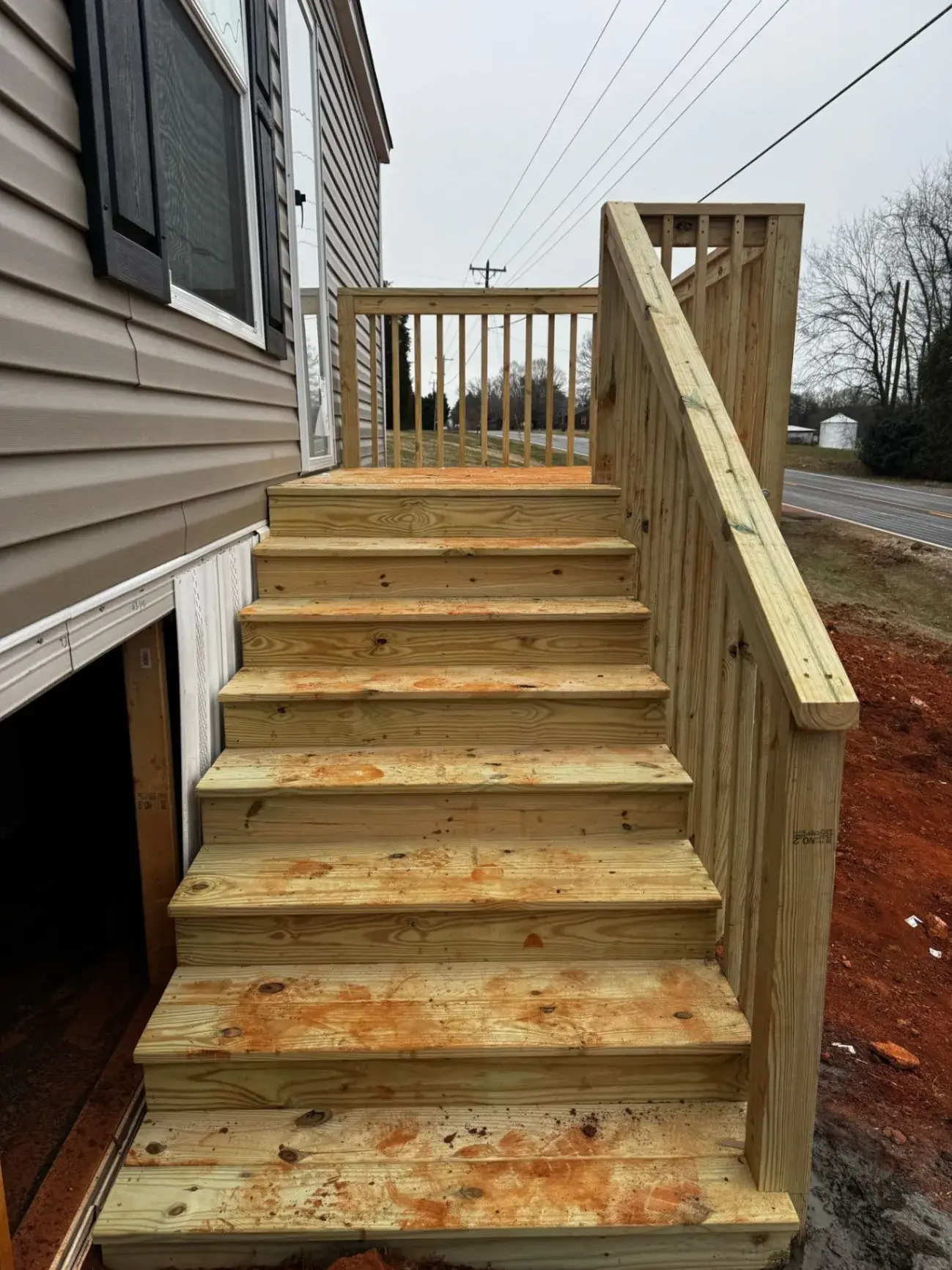 Long straight stair run leading up to a landing