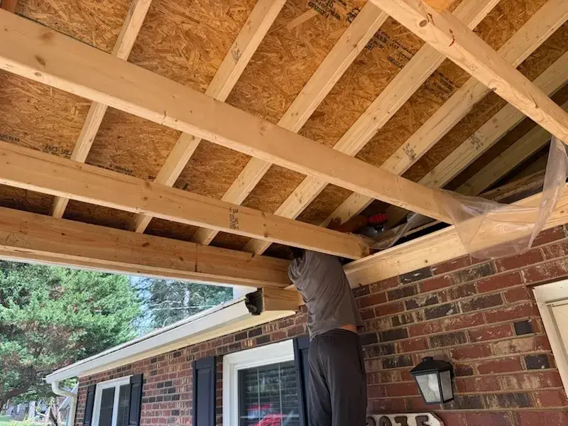Close view of framed porch rafters and sheathing