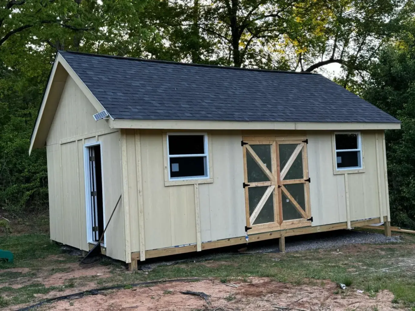 Finished shed with double doors and windows